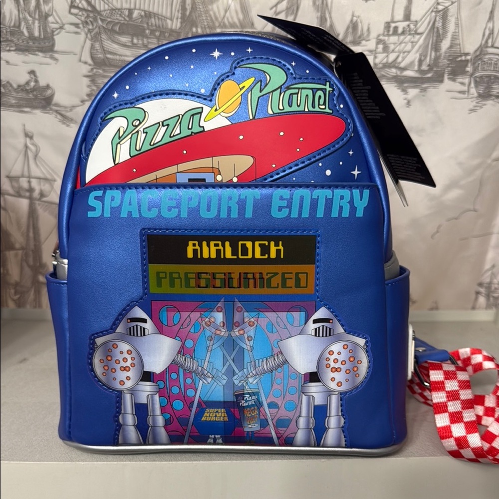 Loungefly Pixar Pizza Planet glow in the dark Lenticular mini back pack NWT